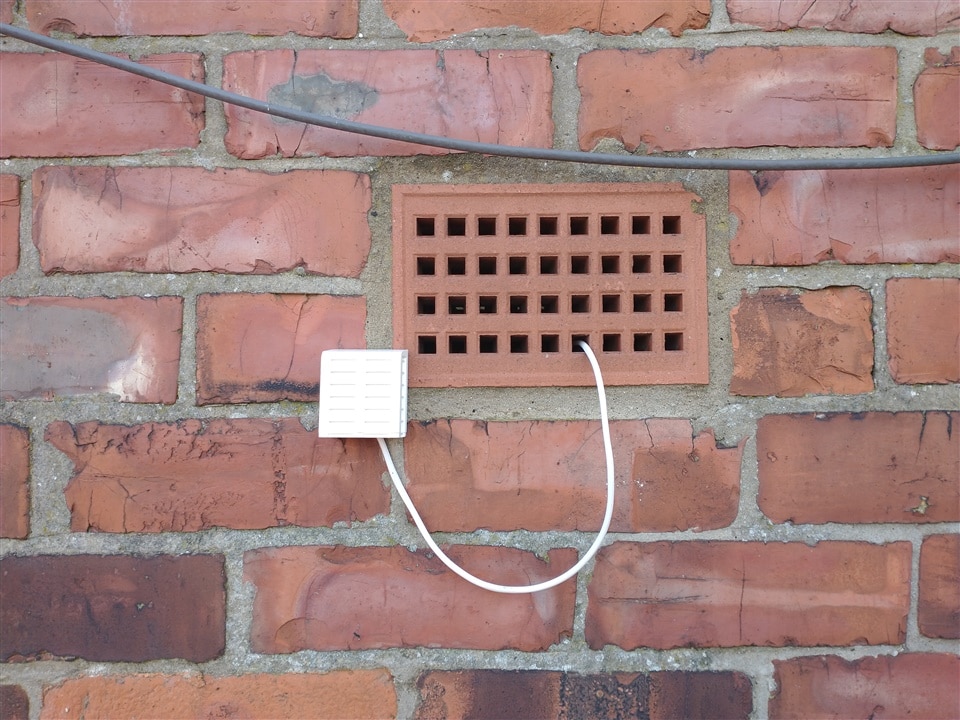 Sensor mounted on outside wall